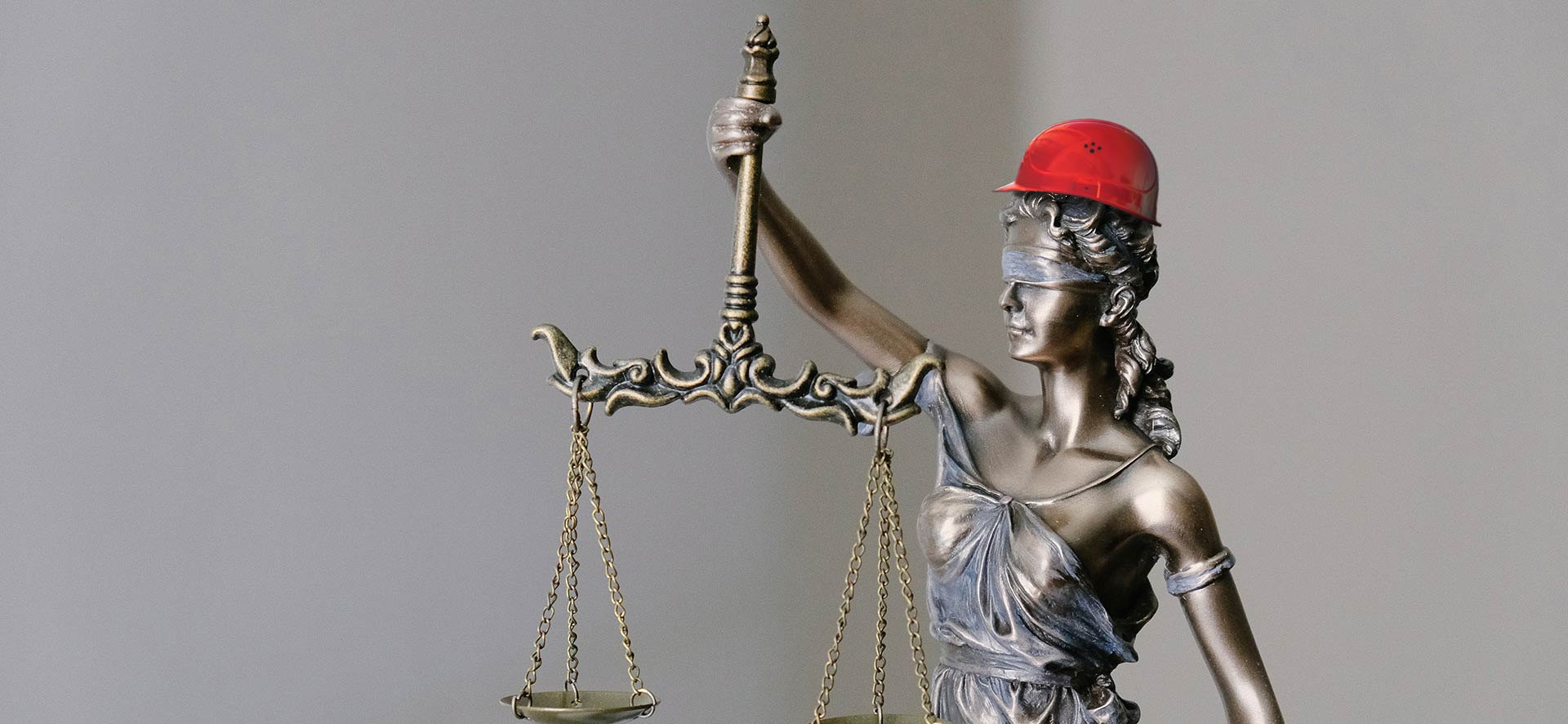 lady justice with a hard hat